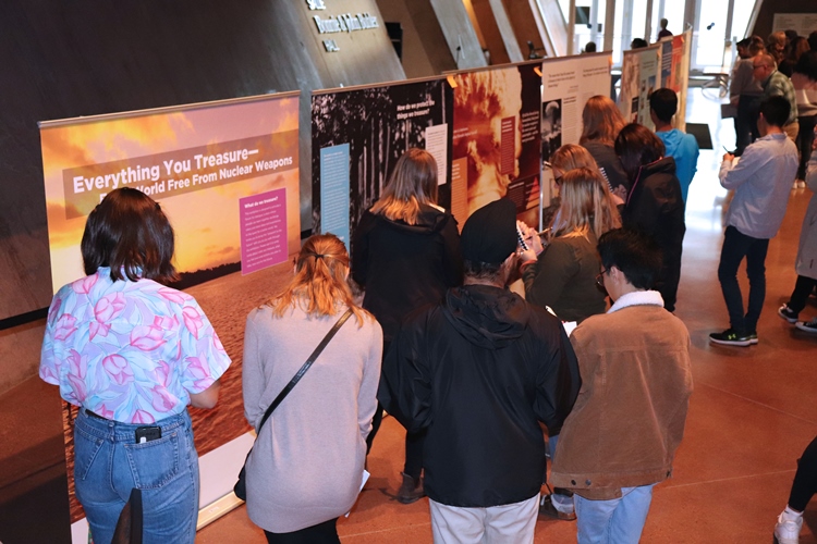Students viewing the "Everything You Treasure-For a World Free from Nuclear Weapons" exhibition